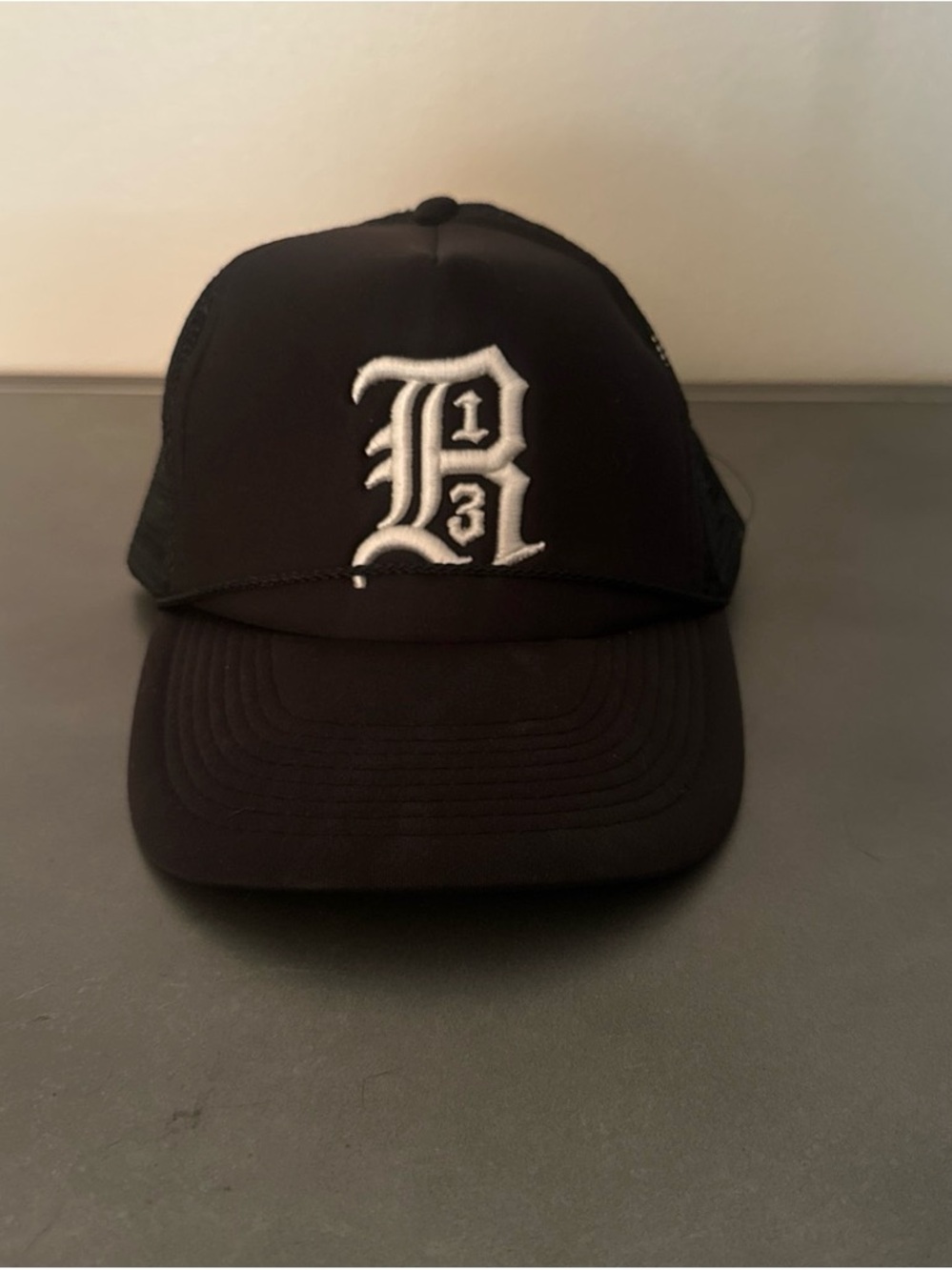 R13 Black Trucker Hat with White Gothic '13' Patch
